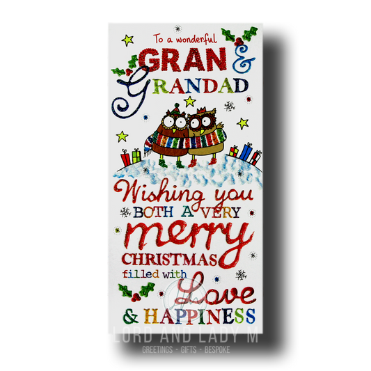 Christmas card for Gran and Grandad featuring two cute owls in scarves, surrounded by colorful presents, holly, stars, and snowflakes.