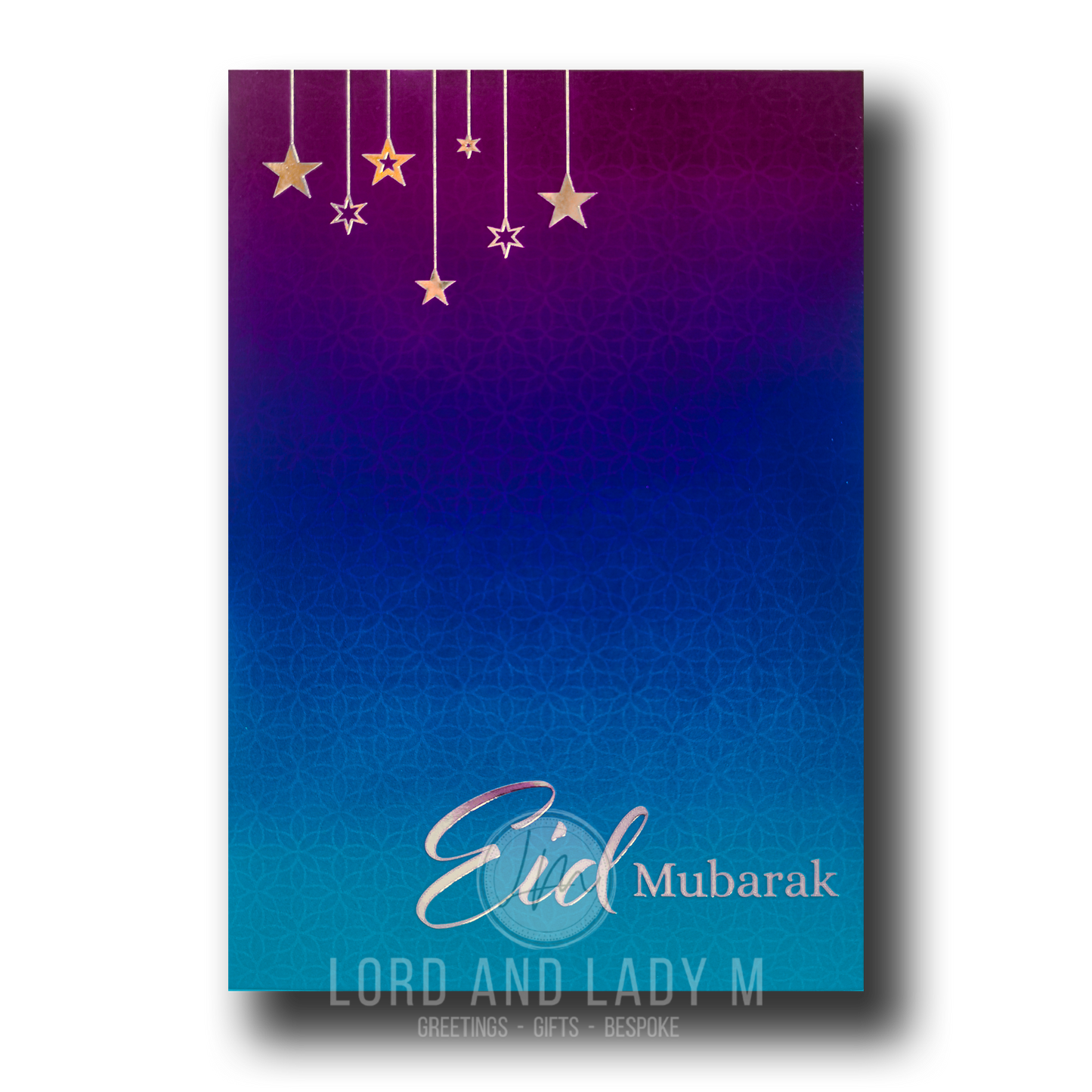 Eid Mubarak greeting card with a purple teal ombre background and gold accents, featuring the text 'Eid Mubarak' and hanging stars.